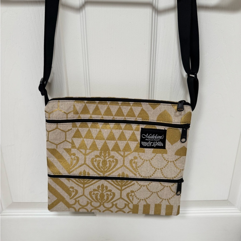 Mailelani’s Patterned Crossbody Bag in Gold and Black